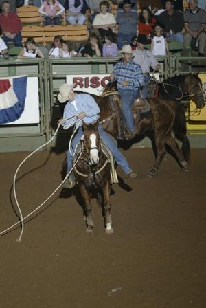 [Event at the Cowtown Coliseum, a roping participant]
