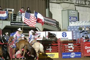[Event at the Cowtown Coliseum, women flag bearers]