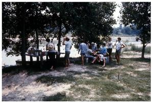 Primary view of object titled '[Photograph of Glen Lake Campers Eating]'.