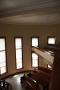 Photograph: [Benches and Balcony in Courtroom]