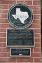 Photograph: [Plaques on Courthouse]