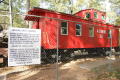Photograph: [Photograph of a Red Train Car]