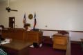Photograph: [Desks in Courtroom]