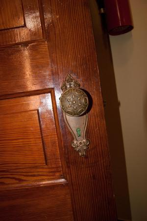 [Close-Up of Carved Door Knob]