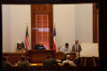 Photograph: [People in Courtroom]