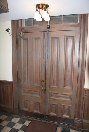 [Photograph of Wooden Double Doors]