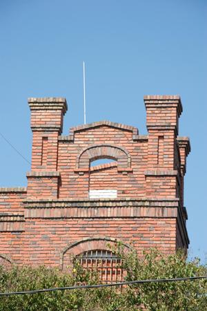 Primary view of object titled '[Red Brick Building in Jourdanton]'.