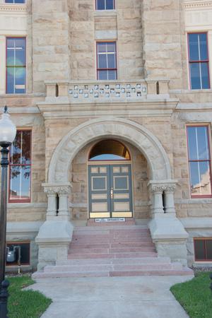 [Photograph of Courthouse Doors]