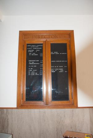 Primary view of object titled '[Photograph of the Liberty County Courthouse Directory]'.