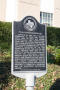 Photograph: [Plaque about Polk County Courthouse]
