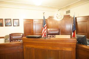 [Photograph of a Judge's Bench]