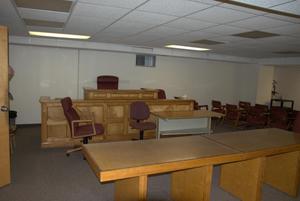 [Interior of Courtroom]