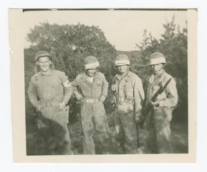 Primary view of object titled '[Four Soldiers Posing by Shrubs]'.