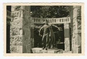 Primary view of object titled '[Edward Scott with German World War I Monument]'.
