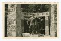 Photograph: [Edward Scott with German World War I Monument]