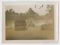 Thumbnail image of item number 1 in: '[Trucks on Riverbank]'.