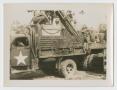 Photograph: [Soldiers Loading Truck]