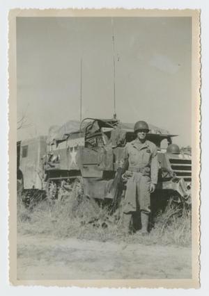 Primary view of object titled '[Soldier Guarding Truck]'.