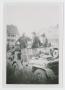 Photograph: [Soldiers on Jeep]