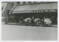Photograph: [Vehicles Outside Store]
