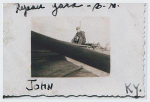 Primary view of object titled '[Soldier in Repair Yard]'.