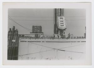 Primary view of object titled '[Men Standing at Railing]'.
