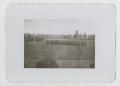 Photograph: [Soldiers Marching on Football Field]