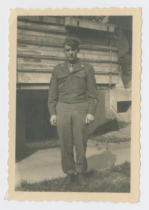 Primary view of object titled '[Soldier In Front of House]'.