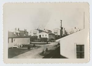 Primary view of object titled '[Truck Parked by Barracks]'.