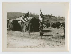 Primary view of object titled '[Flag by Tent]'.