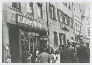 Primary view of object titled '[Crowd Outside Shop]'.