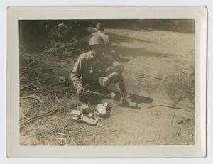 [Soldier Drinking From Tin]