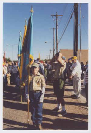 Primary view of object titled '[Boy Scout Holding Flag]'.