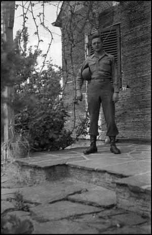 [Soldier in Front of Building]