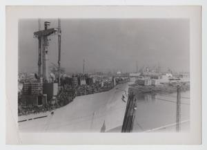 Primary view of object titled '[Docked Ship with Soldiers Loaded on Deck]'.