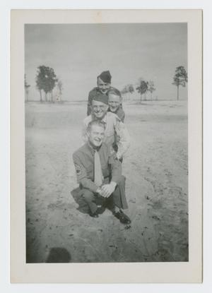 Primary view of object titled '[Four Soldiers on Beach]'.