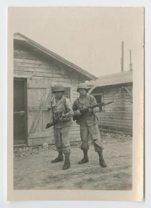 [Soldiers by Wooden Buildings]