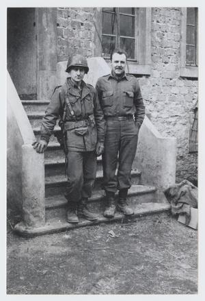 [Two Soldiers by Building]