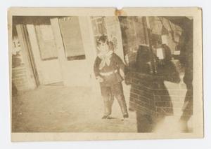 Primary view of object titled '[Photograph of Roy LaVern Wise in Front of Store]'.