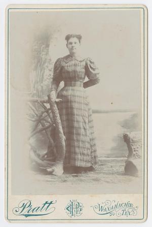 Primary view of object titled '[Photograph of Unidentified Woman Near Wood Fence]'.