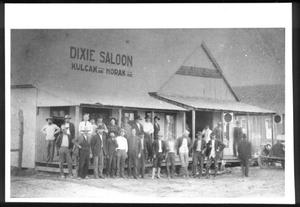 Primary view of object titled '[The Dixie Saloon. Kulcak and Horak Prop., Needville, Texas.]'.