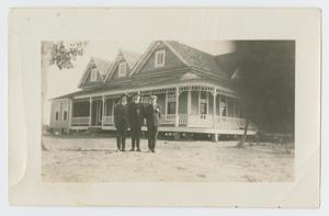 Primary view of object titled '[Photograph of Three Men in Front of House]'.