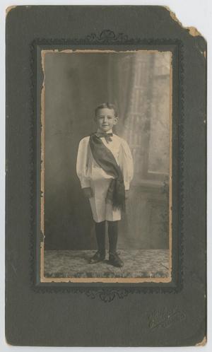 Primary view of object titled '[Photograph of Unidentified Boy with Sash]'.