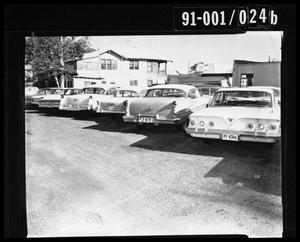 Row of Cars in Parking Lot [Negative]