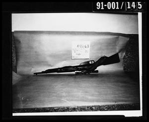 Rifle with Sling and Scope Upside Down