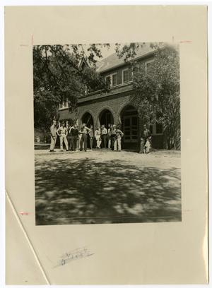 Primary view of object titled 'A Group of Men in Uniform Gathered at the Front of Dickey Hall'.