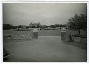 View of Schreiner from the Front Entrence, Vehicles Parked in the Field