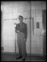 Photograph: Cecil Brower Behind Microphone