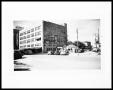 Photograph: Exterior View of Hemphill Wells Department Store and Moutray Oil Serv…