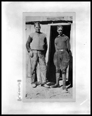 Two Men at Cabin Door